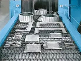Mesh Belt Shot Blasting Machine provide high volume production and cost effective performance for deburring, clea (6).png
